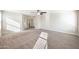 Spacious bedroom with carpet, neutral walls and ceilings, and attached area at 22193 E Via Del Oro --, Queen Creek, AZ 85142