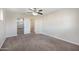 This cozy bedroom offers views to other rooms and neutral walls at 22193 E Via Del Oro --, Queen Creek, AZ 85142