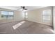 This spacious carpeted bedroom offers large windows and plenty of natural light at 22193 E Via Del Oro --, Queen Creek, AZ 85142