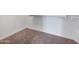 Walk-in closet with white shelving and racks for ample storage, neutral carpet at 22193 E Via Del Oro --, Queen Creek, AZ 85142