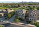 Two-story home with a well-manicured yard and neutral paint, with easy access to neighborhood sidewalks at 22193 E Via Del Oro --, Queen Creek, AZ 85142
