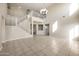 Spacious living room featuring staircase, soaring ceilings, and lots of natural light at 22193 E Via Del Oro --, Queen Creek, AZ 85142