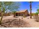 Private backyard with covered patio and low-maintenance desert landscaping at 279 W Stirrup Ln, San Tan Valley, AZ 85143