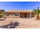 Secluded backyard with tiled patio, perfect for relaxing and entertaining at 279 W Stirrup Ln, San Tan Valley, AZ 85143