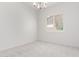 Carpeted bedroom with a window with plantation shutters at 279 W Stirrup Ln, San Tan Valley, AZ 85143