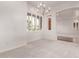 Bright dining room with large windows and a chandelier at 279 W Stirrup Ln, San Tan Valley, AZ 85143