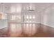 Spacious living room featuring hardwood floors and abundant natural light at 279 W Stirrup Ln, San Tan Valley, AZ 85143