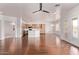 Open-concept living area featuring hardwood floors and bright natural light at 279 W Stirrup Ln, San Tan Valley, AZ 85143