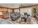Comfortable living room with plush seating and access to outdoor patio at 279 W Stirrup Ln, San Tan Valley, AZ 85143