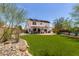 Beautiful two-story home with an inviting backyard and patio area at 2934 S Woodruff Cir, Mesa, AZ 85212