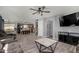 Open-concept living room leading to the kitchen, perfect for entertaining and Gathering gatherings at 2934 S Woodruff Cir, Mesa, AZ 85212