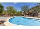 Refreshing in-ground pool perfect for relaxation and summer fun at 2934 S Woodruff Cir, Mesa, AZ 85212