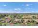 Expansive aerial view of a neighborhood featuring beautiful desert scenery and luxury single-Gathering homes at 3010 E Fruitvale Ave, Gilbert, AZ 85297