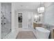 Spacious bathroom featuring a walk-in shower, closet, soaking tub, and double vanity at 3010 E Fruitvale Ave, Gilbert, AZ 85297