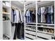 Organized walk-in closet with custom shelving, drawers, and plenty of room for storage at 3010 E Fruitvale Ave, Gilbert, AZ 85297
