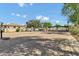 Gated community entrance with lush landscaping, providing security and privacy at 3010 E Fruitvale Ave, Gilbert, AZ 85297