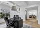 Home office with custom shelving, a large executive desk, and an antler decoration on the wall at 3010 E Fruitvale Ave, Gilbert, AZ 85297