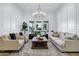 Bright living room with recessed lighting, a bay window, and elegant furnishings for comfortable living at 3010 E Fruitvale Ave, Gilbert, AZ 85297
