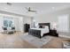 Tranquil main bedroom with ceiling fan, and windows for natural light at 3010 E Fruitvale Ave, Gilbert, AZ 85297