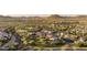 Beautiful aerial view of a Primary-planned community with homes, green spaces, and community amenities at 30404 N 131St Dr, Peoria, AZ 85383