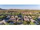 Aerial view of neighborhood homes, mountains in distance at 30404 N 131St Dr, Peoria, AZ 85383
