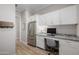 Convenient office space with built-in cabinets, stainless fridge and a welcome space for convenience at 30404 N 131St Dr, Peoria, AZ 85383