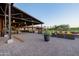 Extensive covered patio offers lots of seating and gathering spots, perfect for outdoor entertainment at 30404 N 131St Dr, Peoria, AZ 85383