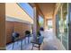 Cozy outdoor patio with comfortable seating, perfect for enjoying the peaceful surroundings at 30404 N 131St Dr, Peoria, AZ 85383