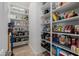 Walk-in pantry with plenty of shelves for optimal storage of food and supplies at 30404 N 131St Dr, Peoria, AZ 85383