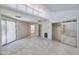 Bedroom features a clerestory window, closet, and sliding doors leading to the backyard pool at 325 W Loma Ln, Phoenix, AZ 85021