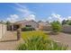 Private backyard featuring desert landscaping, a grass patch and mature desert plants at 3338 E Lavey Ln, Phoenix, AZ 85032