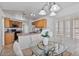 Well-lit kitchen with stainless steel appliances and a cozy breakfast nook at 3338 E Lavey Ln, Phoenix, AZ 85032