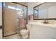 Bathroom featuring tiled walk-in shower and white vanity at 34979 N 30Th Ave, Phoenix, AZ 85086