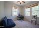 Bedroom with neutral paint, carpet, and a ceiling fan at 34979 N 30Th Ave, Phoenix, AZ 85086