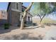 Attractive two-story home with a welcoming front porch, complemented by desert landscaping and picturesque views at 34979 N 30Th Ave, Phoenix, AZ 85086