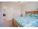 Bedroom with walk in closet, carpet, ceiling fan and large window at 34979 N 30Th Ave, Phoenix, AZ 85086