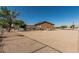 Large, fenced backyard featuring desert landscaping, covered patio, hot tub, offering privacy and outdoor enjoyment at 37334 N 17Th Ave, Phoenix, AZ 85086