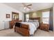 Spacious bedroom with well-placed windows, ceiling fan, and natural wood furnishings at 37334 N 17Th Ave, Phoenix, AZ 85086