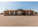 Inviting single-story home with desert landscaping and charming architectural details at 37334 N 17Th Ave, Phoenix, AZ 85086