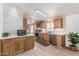 Modern kitchen with stainless steel appliances, wooden cabinetry, and ample counter space at 37334 N 17Th Ave, Phoenix, AZ 85086