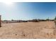 Wide view of the property showing the storage sheds and other features, indicating land use at 37334 N 17Th Ave, Phoenix, AZ 85086
