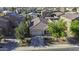 An aerial shot of a charming house with desert landscaping and an expansive roof at 37390 W Merced St, Maricopa, AZ 85138