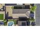 Top-down aerial shot of the home's roof, yard, and surrounding landscape showing the layout at 37390 W Merced St, Maricopa, AZ 85138