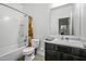 Cozy bathroom featuring a shower-tub combo, and modern vanity at 37390 W Merced St, Maricopa, AZ 85138