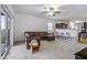 Open concept living area with carpet, lots of natural light and a view to the kitchen at 37390 W Merced St, Maricopa, AZ 85138