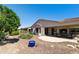 Charming backyard with a covered patio and low maintenance desert landscaping for peaceful outdoor enjoyment at 4229 E Nightingale Ln, Gilbert, AZ 85298