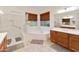 Spa-like main bathroom with a separate shower, garden tub, and dual vanities at 4229 E Nightingale Ln, Gilbert, AZ 85298