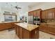 Spacious kitchen features a large island with granite countertops and stainless steel appliances at 4229 E Nightingale Ln, Gilbert, AZ 85298