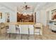 Open-concept kitchen includes granite countertops and breakfast bar seating at 4229 E Nightingale Ln, Gilbert, AZ 85298