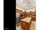 Modern kitchen with stainless steel appliances, granite countertops, and an island at 4229 E Nightingale Ln, Gilbert, AZ 85298